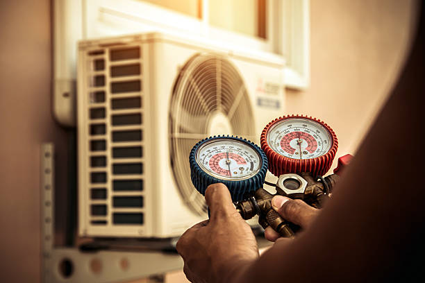 Professional Air Conditioning Service technician working in Jamestown, KY